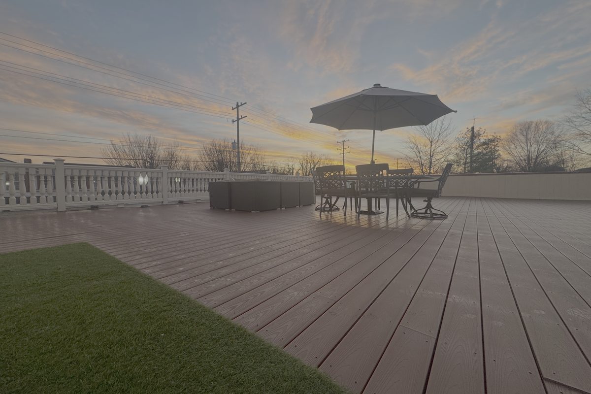 The Hive's rooftop terrace at dusk arranged for a gathering