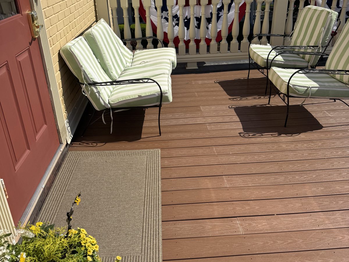 The Hive's rooftop deck dressed for a festive celebration with seating and decor