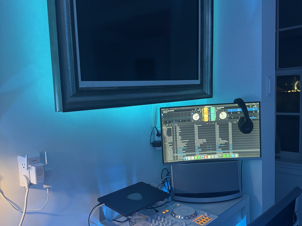 The Hive's production studio with a large display, console, and accent lighting
